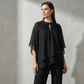 ✨ Elegantes zweiteiliges Set mit asymmetrischer mehrlagiger Bluse und weiter Hose. 🕊️