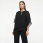 ✨ Elegantes zweiteiliges Set mit asymmetrischer mehrlagiger Bluse und weiter Hose. 🕊️