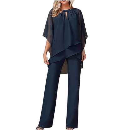 ✨ Elegantes zweiteiliges Set mit asymmetrischer mehrlagiger Bluse und weiter Hose. 🕊️