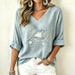 🌸 Print-T-Shirt mit V-Ausschnitt – Leichter Stoff, atmungsaktiv & vielseitig kombinierbar – Ideal für Frühling, Sommer & entspannte Stunden