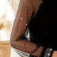 Elegantes Paillettentop für Damen mit transparenten Mesh-Ärmeln