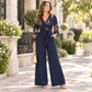 📢🎉50%Rabatt!!!🛍️✨Elegante Jumpsuit mit Blumenprint, Wickel-V-Ausschnitt, weitem Bein, Taillenschnürung und gekräuselten 3/4-Ärmeln